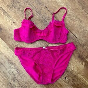 BECCA fuchsia ruffle bikini. Lightly padded top with under wire.  Size large